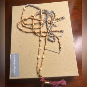 Noonday Collection double stranded necklace gray/maroon /tan with tassel